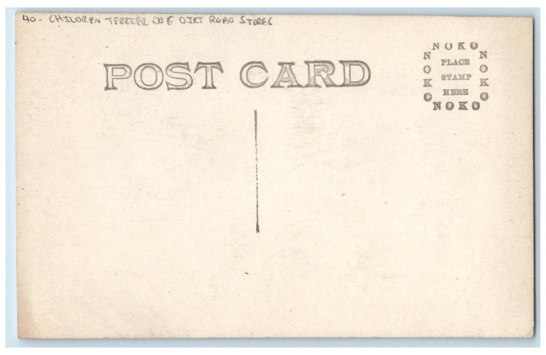 c1910's Children Terrier Dog Dirt Road Stores RPPC Photo Antique Postcard