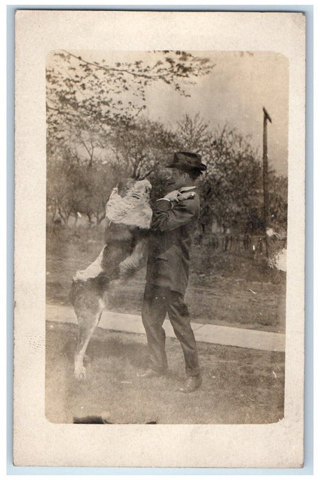 c1910's St. Bernard Dog Pet Candid Man Cigar RPPC Unposted Photo Postcard