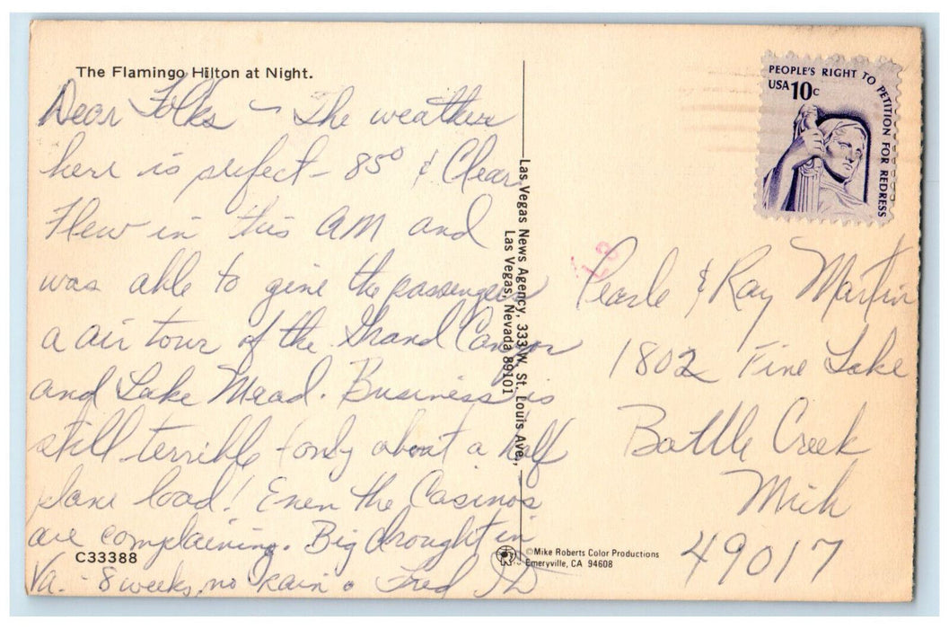 c1950's Flamingo Hilton at Night Greetings from Las Vegas NV Vintage Postcard