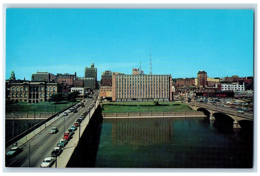 c1960's YMCA Bldg. Hotels, Kirkwood, Savery, Bridge. Des Moines IA Postcard