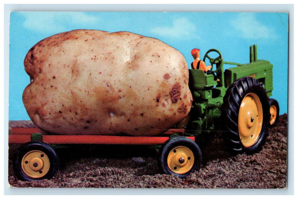 1956 An Idaho Exaggerated Potato on a Trucktor, Heber, Utah UT Postcard
