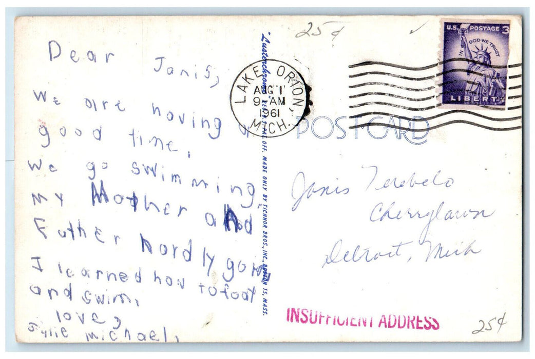 1961 Two Men Boat Canoeing Greetings from Lake Orion Michigan MI Postcard