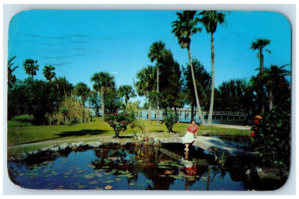 1956 Woman Stting in the Foot Bridge Daytona Beach Florida FL Posted Postcard