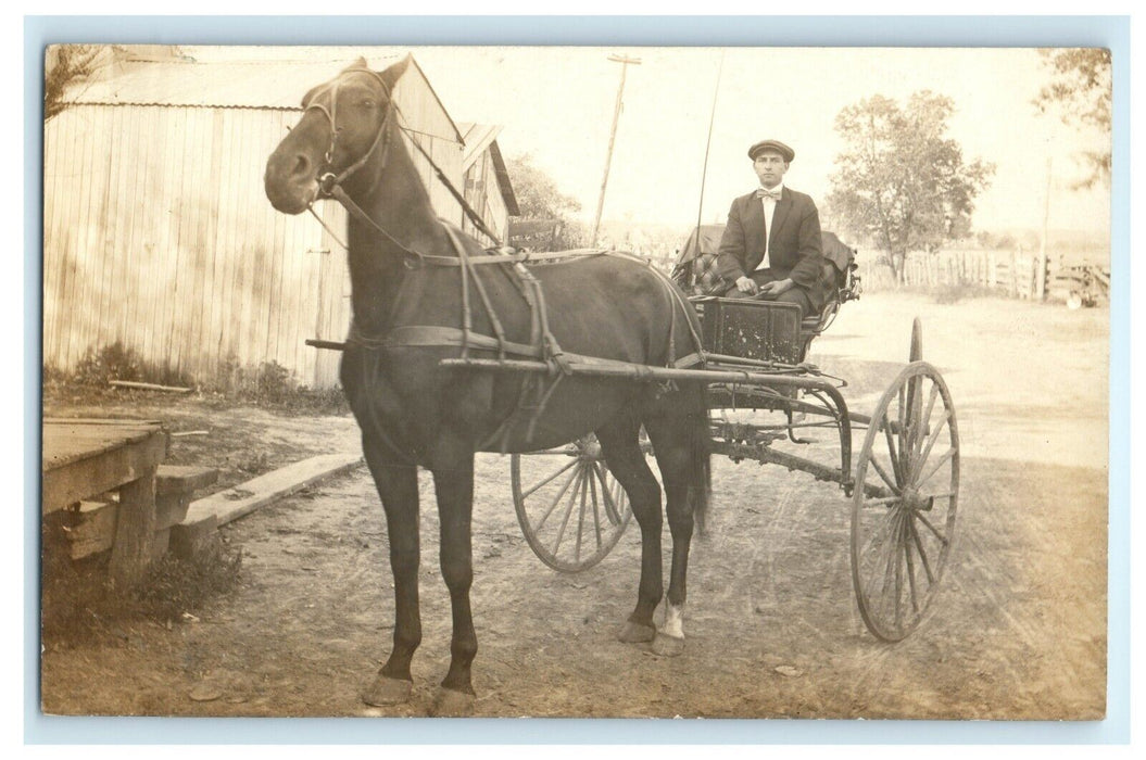c1910 Man w/ Bowtie Showing Off Horse Buggy Wagon Dirt Road RPPC Photo Postcard