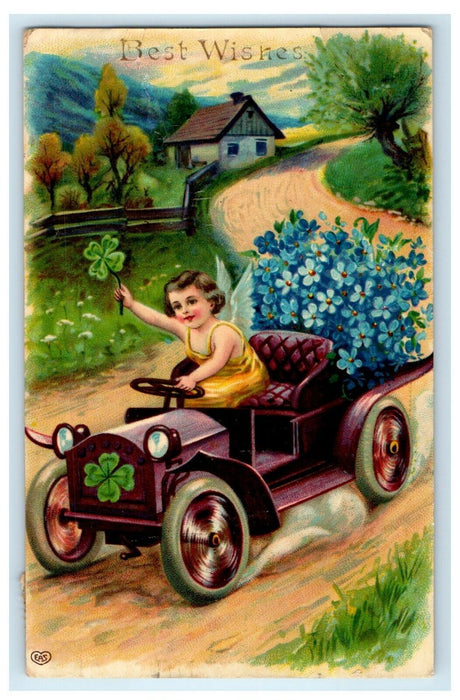 1909 Best Wishes Driving Cherub Angel Shamrock Car Pansies Flowers Postcard