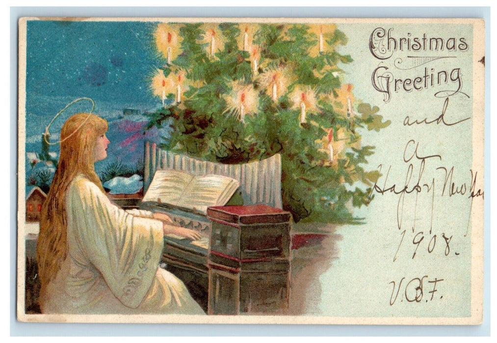 1908 Christmas Greetings Angel Playing Piano Candle Light Embossed Postcard