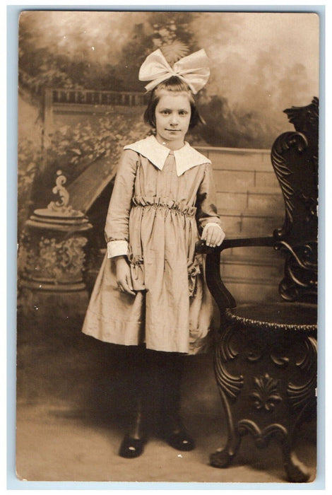 c1910's Studio Portrait Girl Child Cute Bow Dress RPPC Photo Unposted Postcard