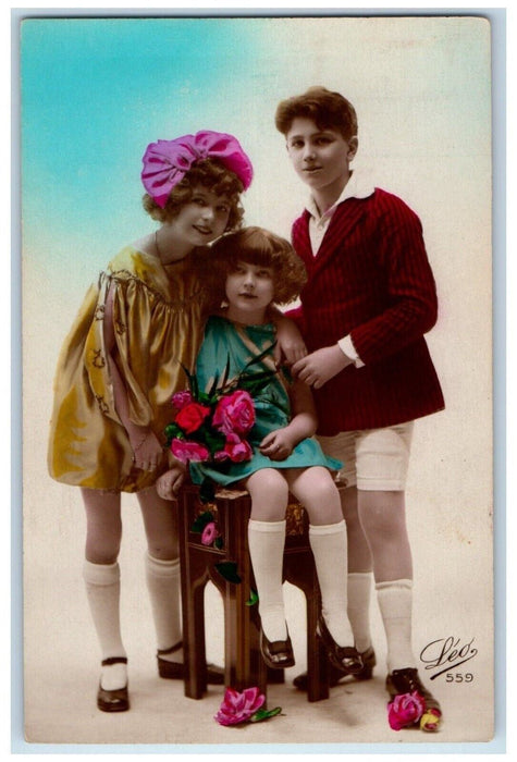 Childrens Leo Studio Portrait Flowers France RPPC Photo Antique Postcard