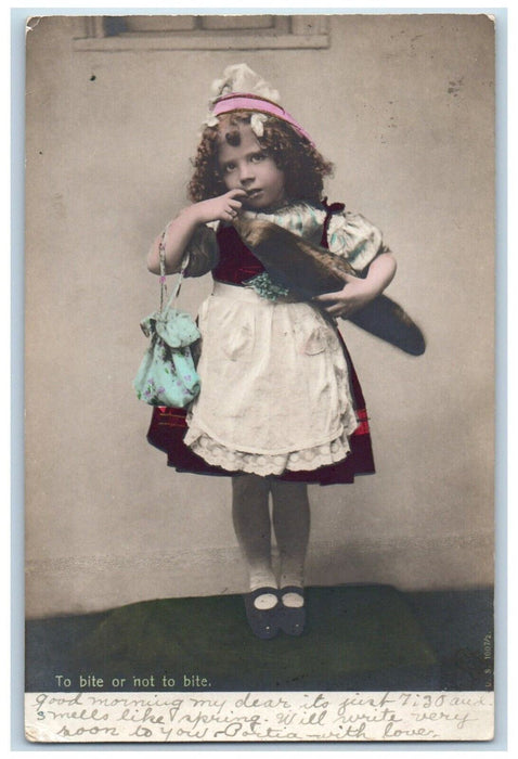 1908 Little Girl To Bite Or Not To Bite Cokato MN RPPC Photo Antique Postcard