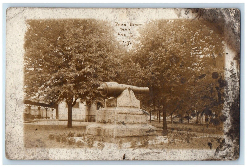 c1910's Pennsylvania Railroad Depot Monument Cannon Ada OH RPPC Photo Postcard