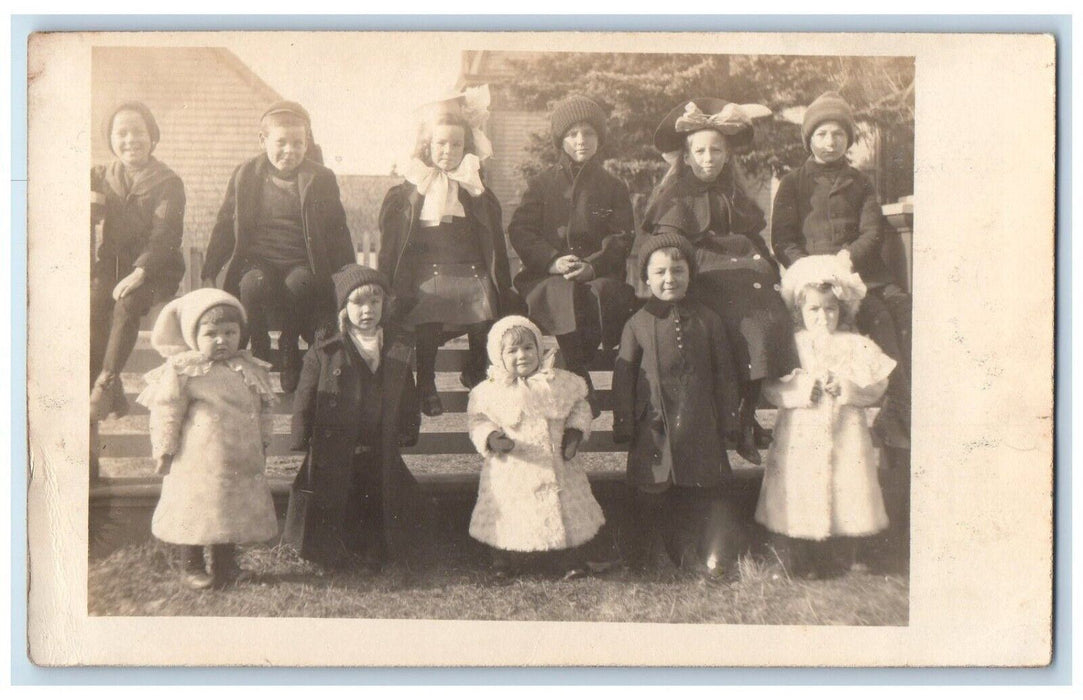 c1909 Candid Children Boys Girls Bows Hats Coats RPPC Photo Unposted Postcard