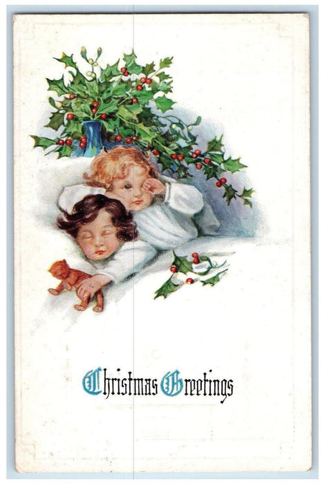 1915 Christmas Greetings Childrens In Bed Toy Holly Berries Winsch Back Postcard