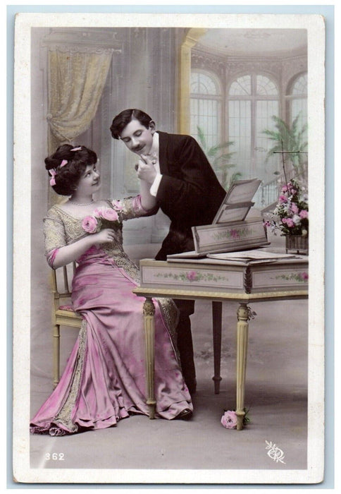 c1910's Sweet Couple Holding Hands Harpsichord Flowers RPPC Photo Postcard