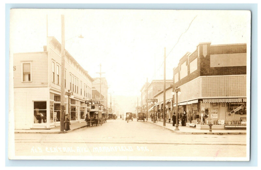 1918 Central Ave. Marshfield Oregon RPPC Photo Drugs Pianos Signs Postcard