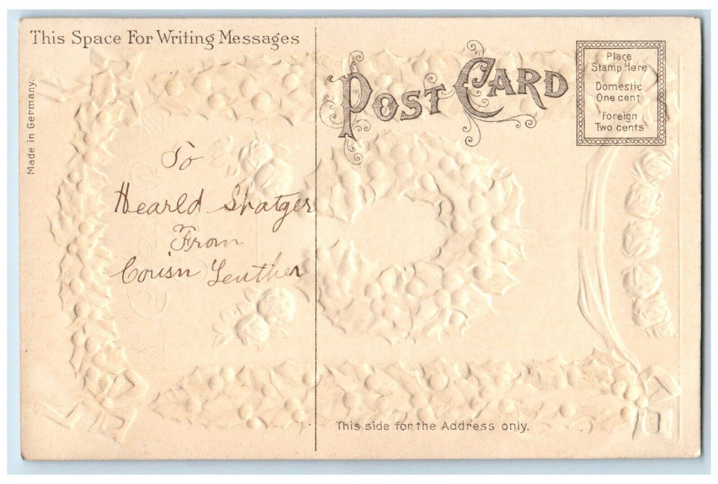 c1910's Merry Christmas Holly Berries Ribbon Flowers Embossed Antique Postcard
