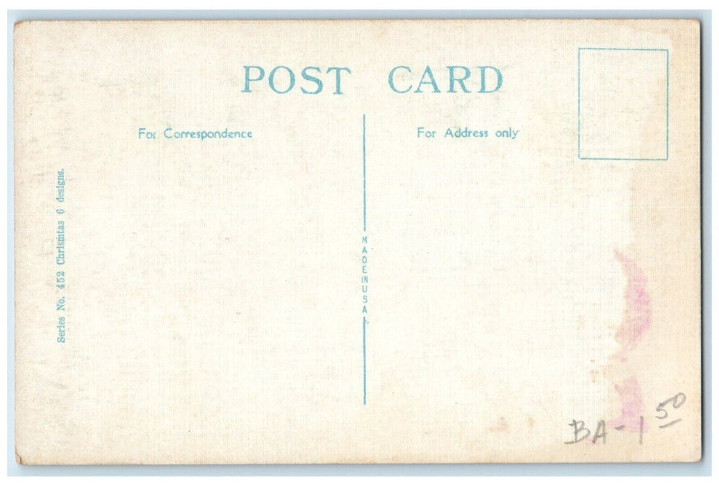 c1910's Christmas Day Child Holly Berries Fireplace Candle Light Postcard