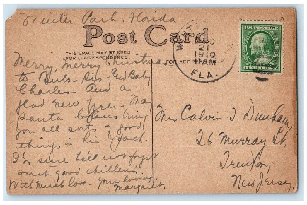 1910 Christmas Ringing Bell Horseshoe Pansies Flowers Winter Park FL Postcard