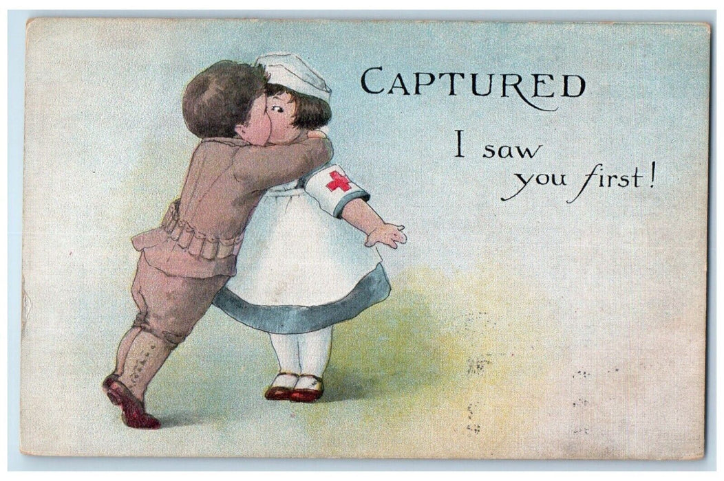 1919 Little Soldier And Nurse Kissing Romance Captured WWI Hamlet OR Postcard