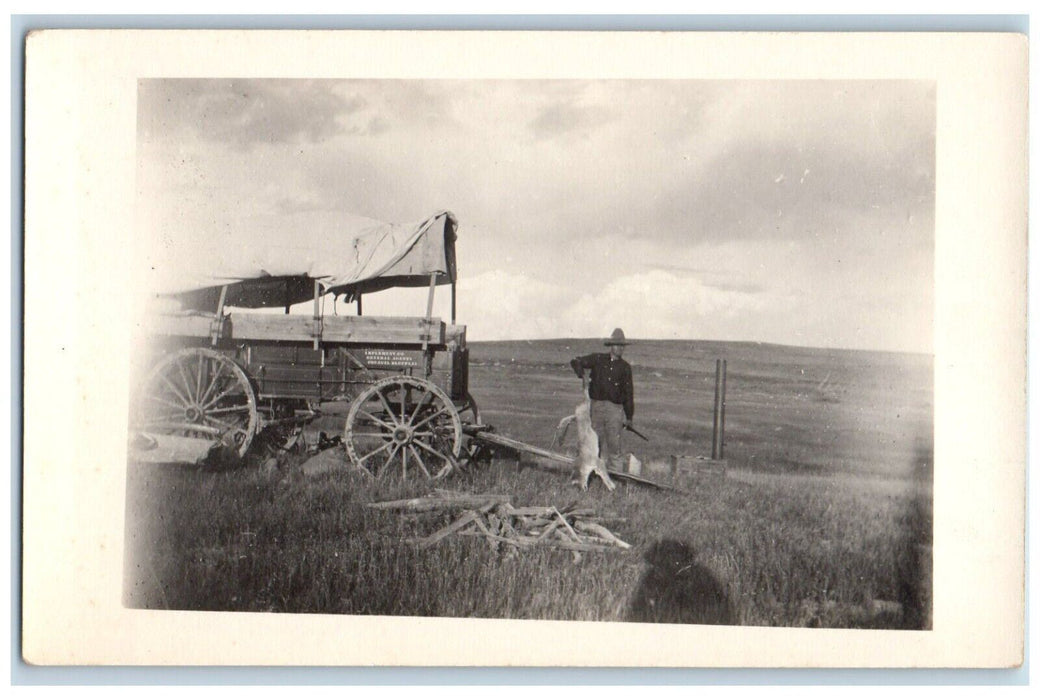c1910's Candid Man Dead Coyote Rifle Council Bluffs Iowa IA RPPC Photo Postcard