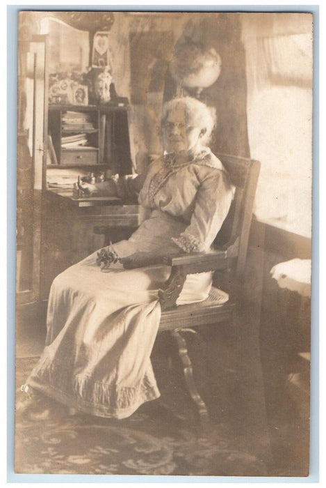 c1910's Residence Interior Old Woman Globe Desk Flower RPPC Photo Postcard