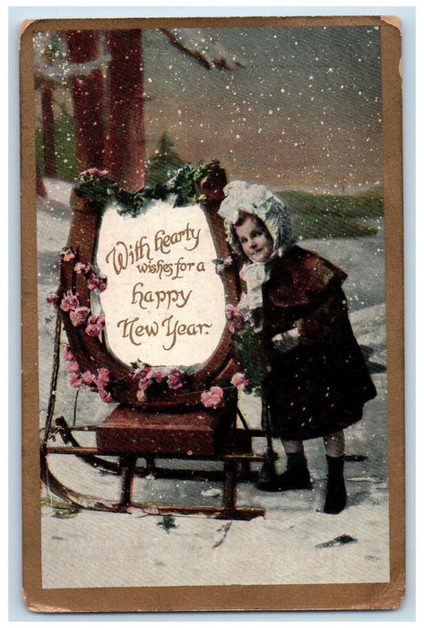 1910 Happy New Year Girl Horsehoe Sleigh Flowers Winter Snowfall Posted Postcard