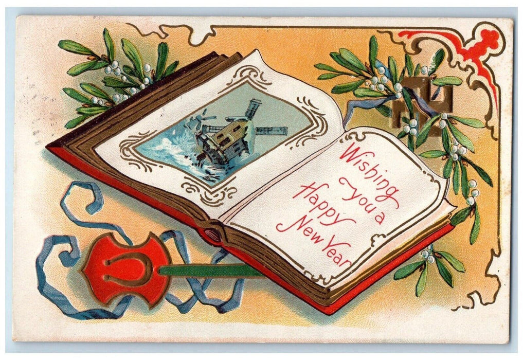 c1910's Happy New Year Good Luck Sign Mistletoe Book Windmill Embossed Postcard