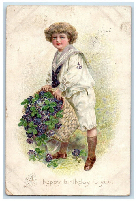 1910 Birthday Boy With Pansies Shamrock In Basket Tuck's Stanley IA Postcard