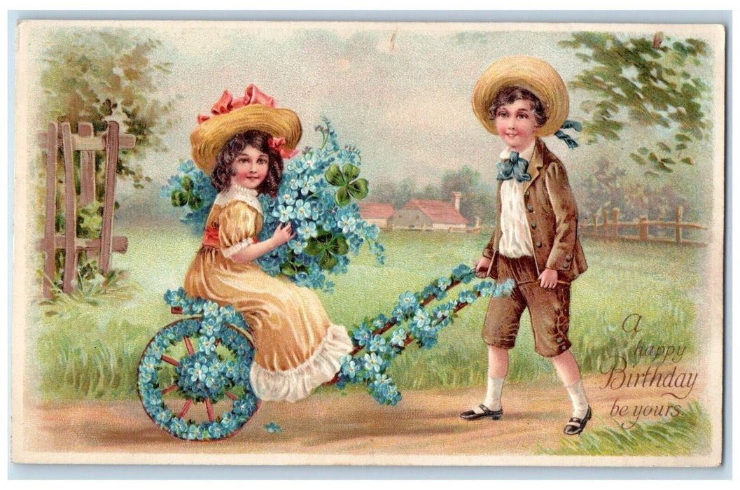 c1910's Birthday Children Boy Pushing Cart Shamrock Flowers Embossed Postcard