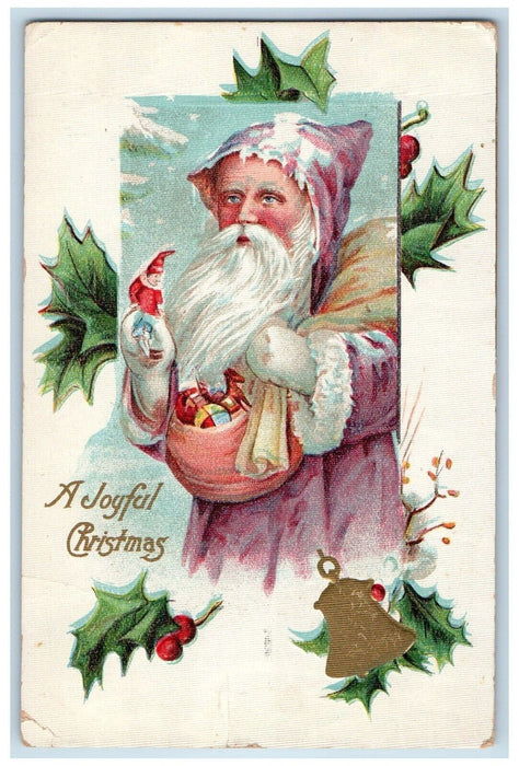 c1910's Merry Christmas Pink Robe Jester Toys Holly Berries Bell Posted Postcard