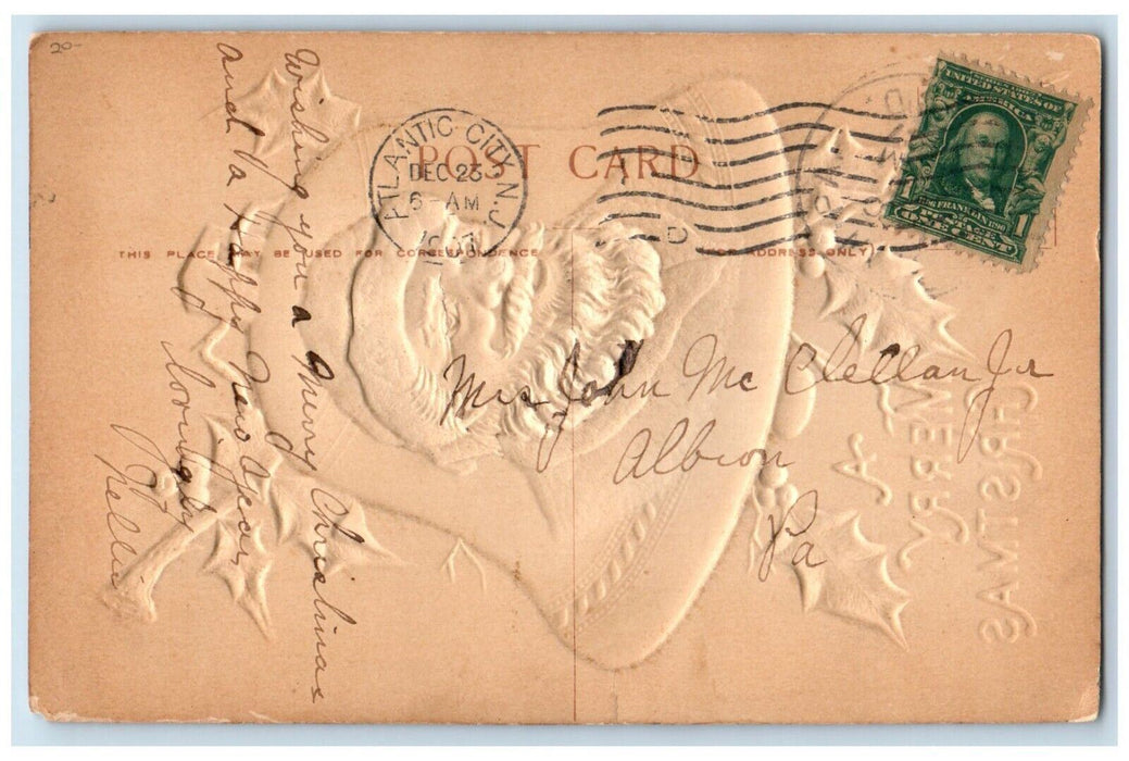 1907 Christmas Santa Claus Bell Holly Berries Airbrushed Embossed Postcard