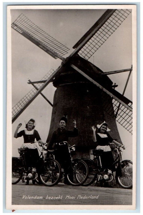 c1940s Dutch Man Women Bicycle Windmill Volendam Netherlands RPPC Photo Postcard