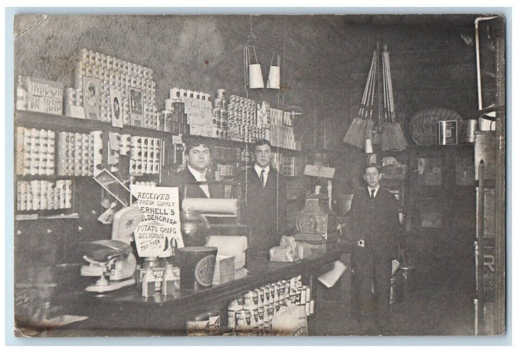 1910 Business Shop Interior View Cans Broom Workers Kent OH RPPC Photo Postcard