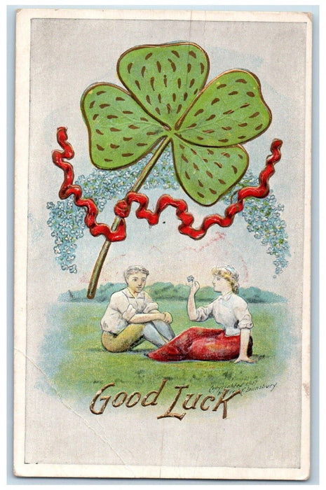 c1910's Good Luck Couple Romance Under Giant Shamrock Flowers Embossed Postcard