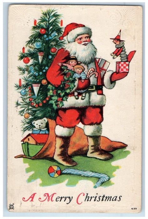 1920 Christmas Santa Claus Sack Of Toys Jester In The Box Embossed Postcard