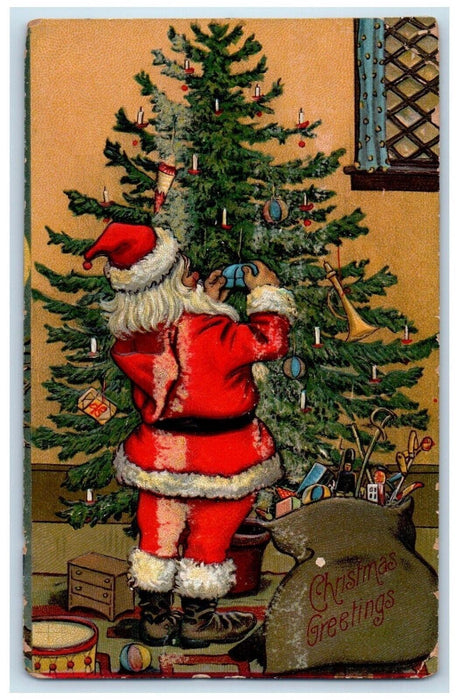 c1910's Christmas Santa Claus Decorating Christmas Tree Embossed Postcard