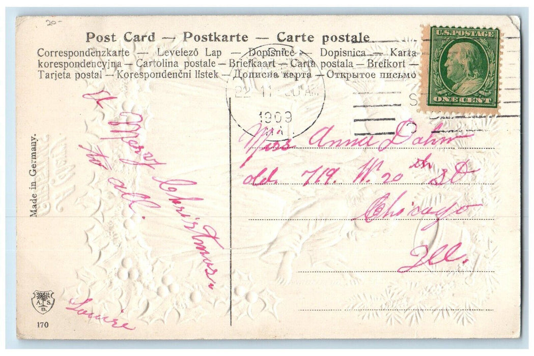1909 Merry Christmas Angles Ringing Bells Pine Leaves Berries Embossed Postcard