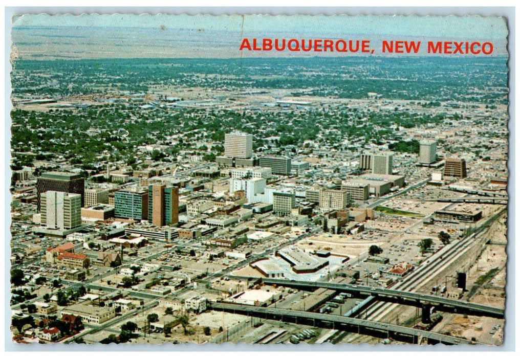 1977 Albuquerque Aerial View Twin Bridge Buildings Roads New Mexico NM Postcard