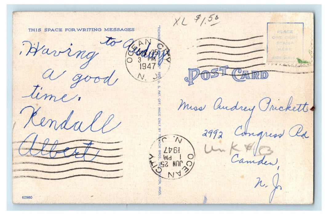 1947 Enjoying a Motor Boat Ride, American Flag, Steamboat in Background Postcard