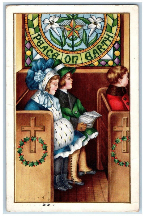 1915 Christmas Children On Church Handwarmer Embossed Newcastle Ohio OH Postcard