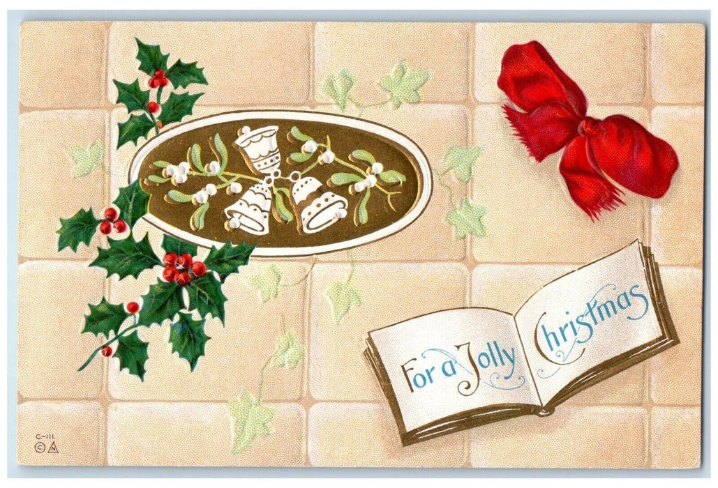 c1910's Jolly Christmas Holly Berries Mistletoe Ringing Bells Embossed Postcard