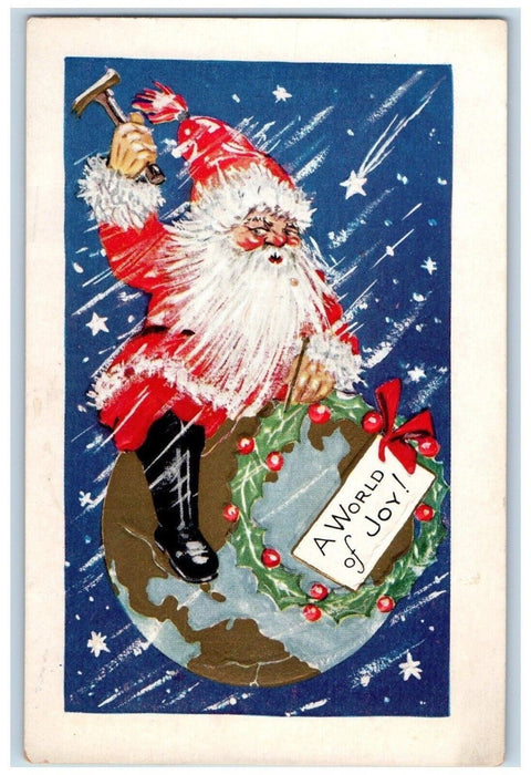 c1910's Christmas Santa Claus Hammer Whreath Berries Embossed Antique Postcard