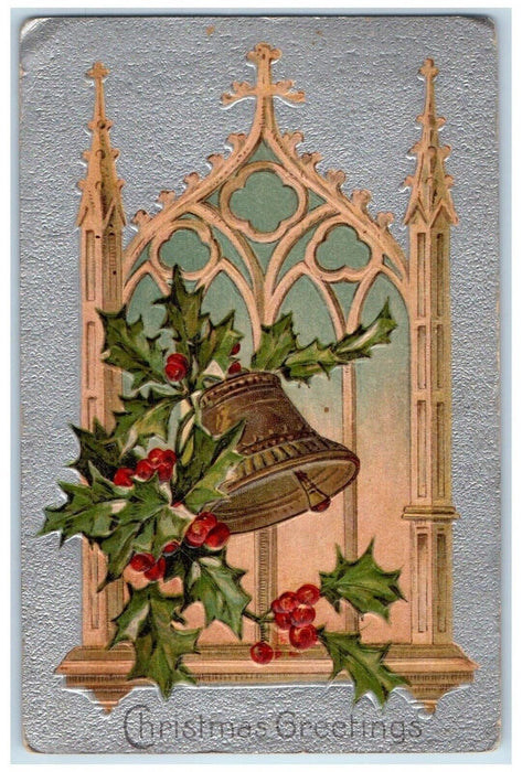 1910 Christmas Greetings Holly Berries Ringing Bell Church Embossed Postcard