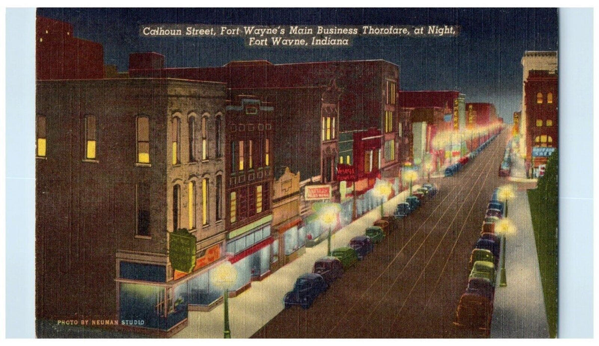 1949 Calhoun Street Fort Wayne's Main Business Thorofare Night Cars IN Postcard