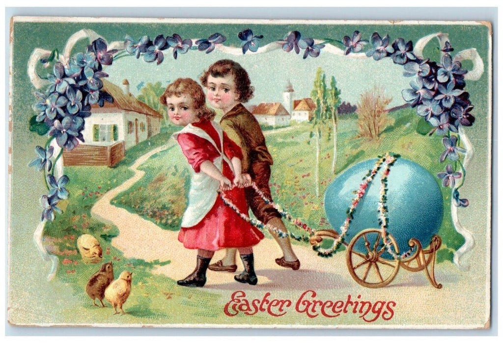 1910 Easter Greetings Children Pulling Cart Egg Chicks Flowers Houses Postcard