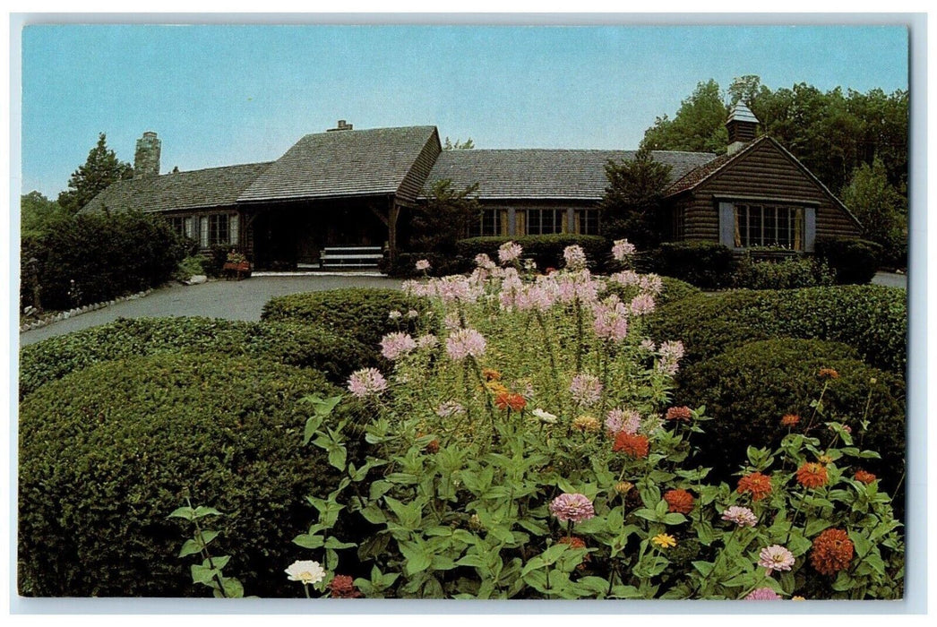 c1960 Exterior View Log Cabin Holyoke Massachusetts MA Flowers Garden Postcard