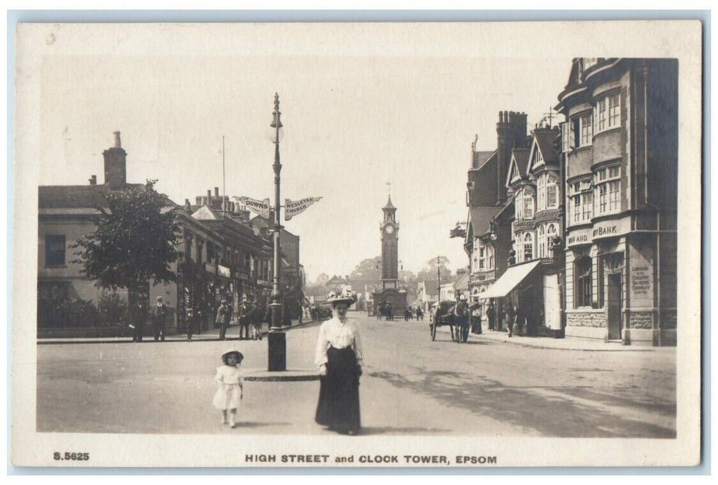 c1910's High Street Clock Tower View Child Epsom England RPPC Photo Postcard