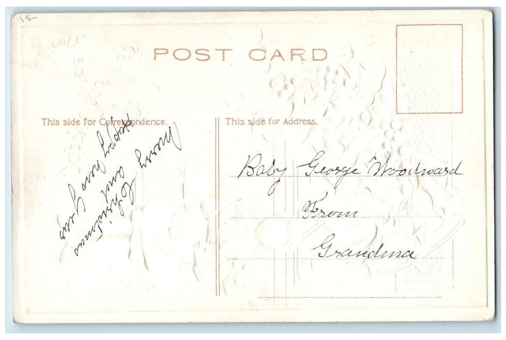 c1910's Christmas Tide Colonial Boy And His Toys Holly Berries Embossed Postcard