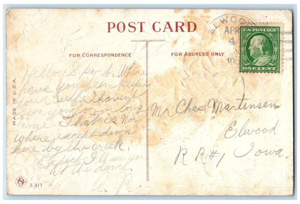 c1910's Easter Rabbit Flowers Ringing Bell Elwood Iowa IA Embossed Postcard