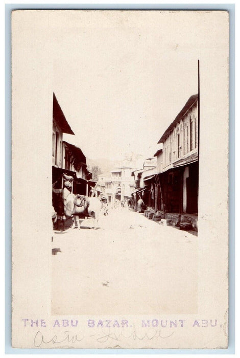 c1920's The Abu Bazaar Street View Cow Mount Abu India  RPPC Photo Postcard