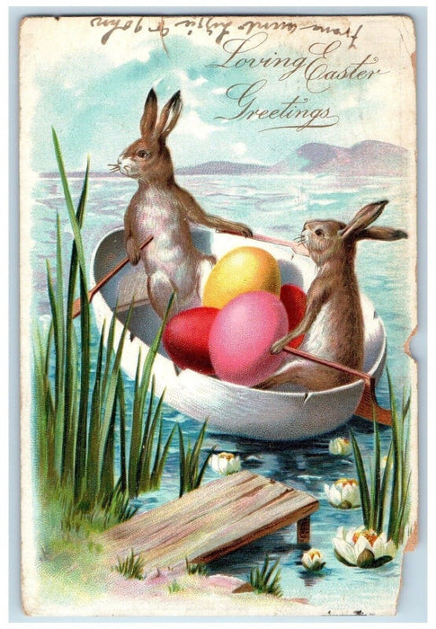 1907 Easter Greetings Anthropomorphic Rabbit Boat Paddle Eggs Tuck's Postcard